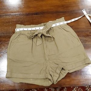 High rise shorts soft shorts with eleastic waist and adjustable tie belt.